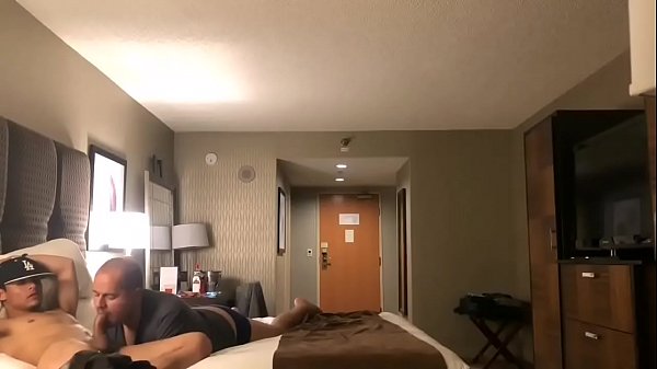 Young Latin dude lets his horny older uncle suck and fucks him in hotel room